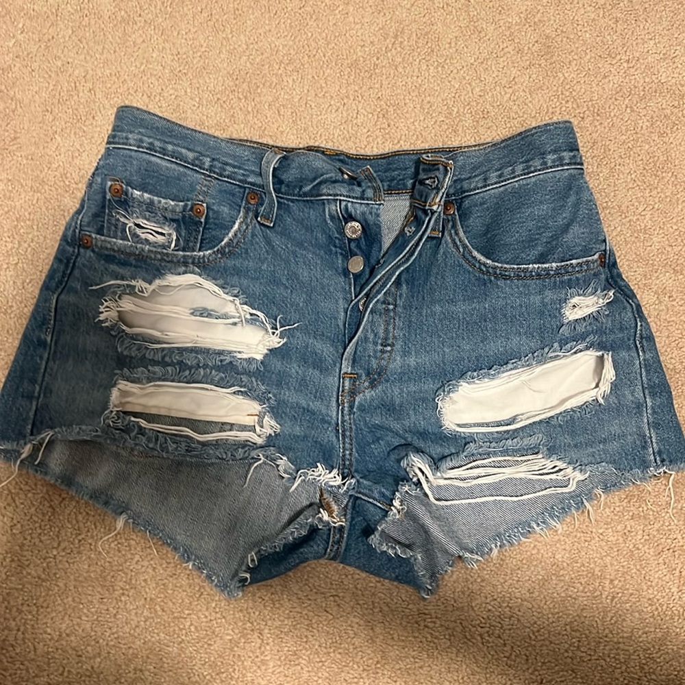 Mid rise dark wash jeans. Barely worn good condition. Fits size 4 waist